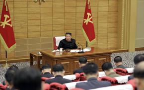 North Korean leader Kim Jong Un presides over a politburo meeting to discuss the country's response to a COVID-19 outbreak, Sunday, May 15, 2022.