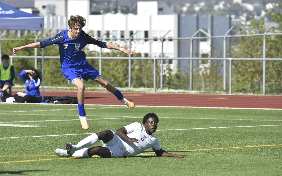 Wiesbaden team captain Jacob Goodman finishes a shot on goal against Lakenheath in Wiesbaden, Germany on April 6, 2024. Goodman scored a goal during the game.