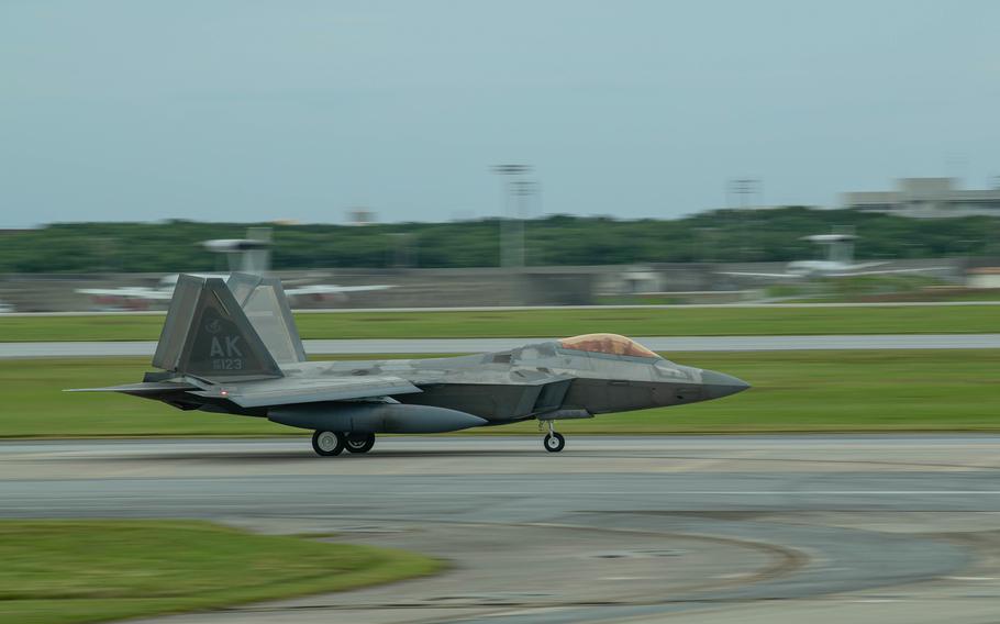 An Air Force F-22A Raptor assigned to the 3rd Wing lands at Kadena Air Base, Okinawa, Friday, Nov. 4, 2022, for a temporary deployment. 