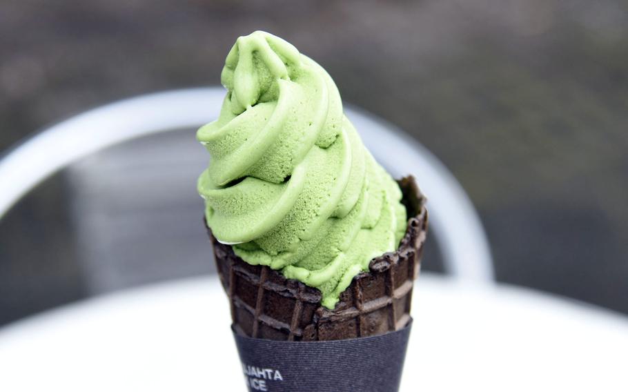 Green tea soft serve ice cream on a chocolate cone is just one of many snacks available at Showa Memorial Park in Tachikawa, Japan. 