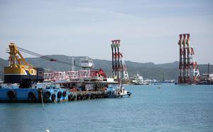 Construction vessels float on Oura Bay at the site of a future U.S. Marine Corps airfield at Camp Schwab, Okinawa, April 16, 2025.