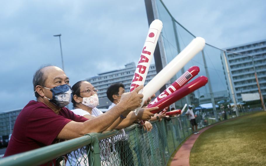 Spectators watch the U.S. Women's Olympic softball team's exhibition game against the Iyo Bank Vertz in Iwakuni, Japan, July 9, 2021.