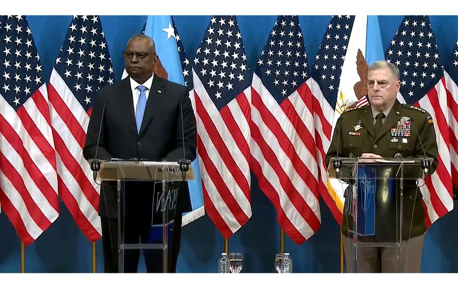 Defense Secretary Lloyd Austin, left, and Gen. Mark Milley, chairman of the Joint Chiefs of Staff, address reporters after a meeting of the Ukraine Defense Contact Group in Brussels on Thursday, June 15, 2023.