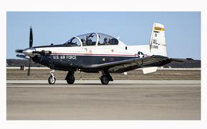 This image provided by the U.S. Air Force shows a U.S. Air Force T-6A Texan II taxiing down the flight line at Laughlin Air Force Base, Texas, on Jan. 26, 2024. The Air Force says an instructor pilot was killed when the ejection seat activated while the jet was still on the ground at Sheppard Air Force Base in Wichita Falls, Texas, when the seat activated during ground operations on May 13. (Airman 1st Class Keira Rossman/U.S. Air Force via AP)