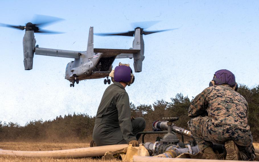 Members of Marine Wing Support Squadron 172 refuel an MV-22B Osprey at Ojojihara Proving Grounds, Japan, in preparation for the Resolute Dragon exercise, Dec. 3, 2021.