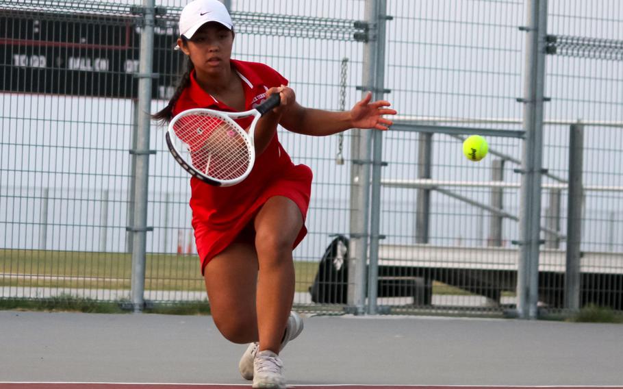 Marisol Hindie sends the ball away.