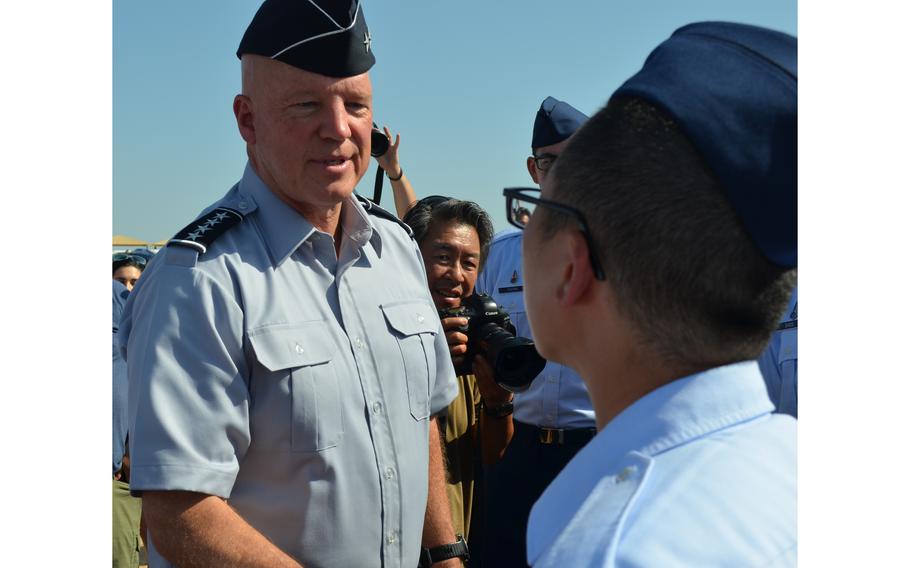 Gen. John Raymond, chief of space operations, congratulates the 71 new guardians to graduate basic training Thursday, June 23, 2022, and enter the Space Force. The trainees were the first to participate in a unique, space-centric curriculum in conjunction with Air Force basic training at Joint Base San Antonio-Lackland Air Force Base in Texas.