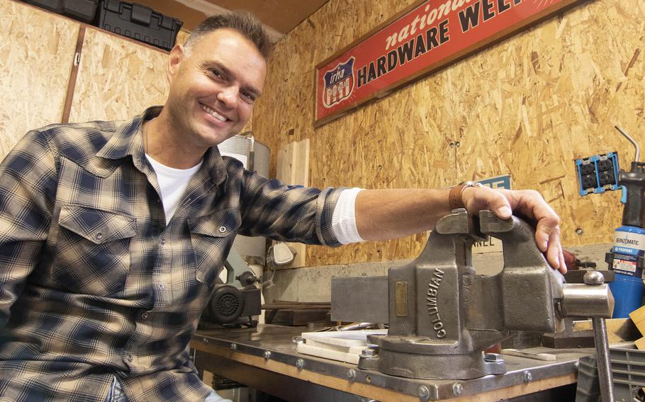 Justin Billard of Brighton Township exhibits one of his more prized restorations, a Columbian bench vise perhaps dating back to pre-1949. Tuesday, Nov. 9, 2021.