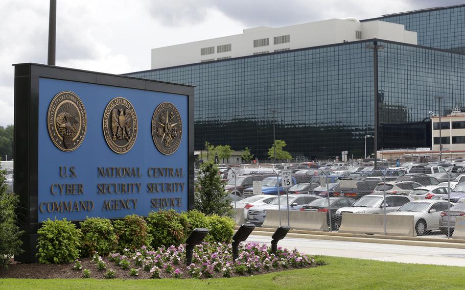 A sign stands on the campus of the National Security Agency (NSA) in Fort Meade, Maryland, on June 6, 2013.  Jareh Sebastian Dahlke, 30, a former National Security Agency employee from Colorado who is accused of trying to sell classified information to Russia, will remain behind bars pending prosecution, a magistrate ruled Tuesday, Oct. 11, 2022.