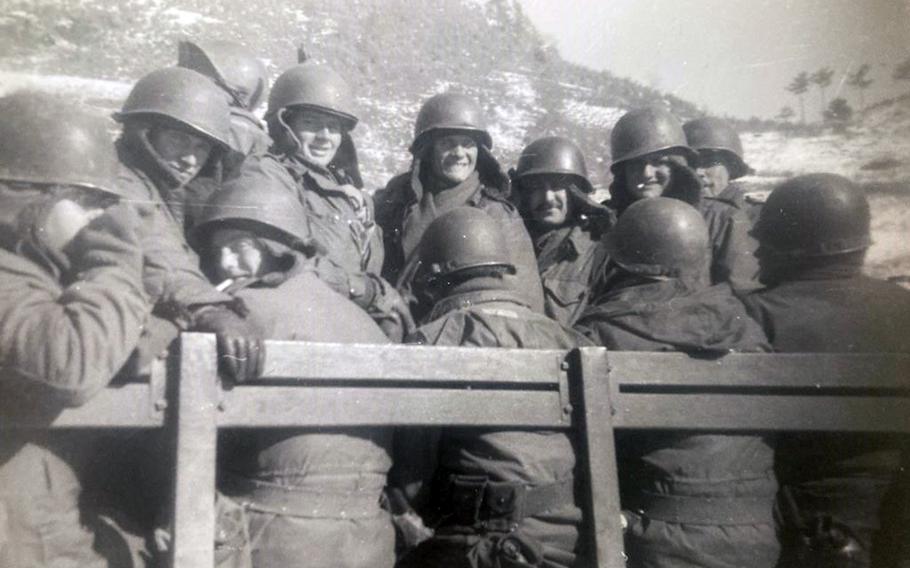 U.S. soldiers ride in the back of a truck in this undated photo from the Korean War.
