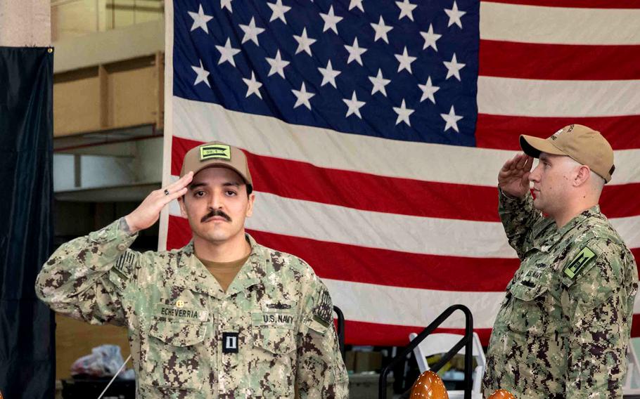 Lt. Luis Echeverria, commander of Task Group 59.1, takes the reins during a commissioning ceremony for the unit in Manama, Bahrain, on Jan. 3, 2024.