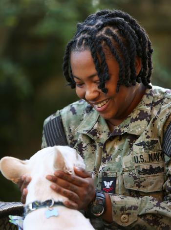 Petty Officer 2nd Class Myesha Harris and Nipsey are reunited Oct. 14, 2022.