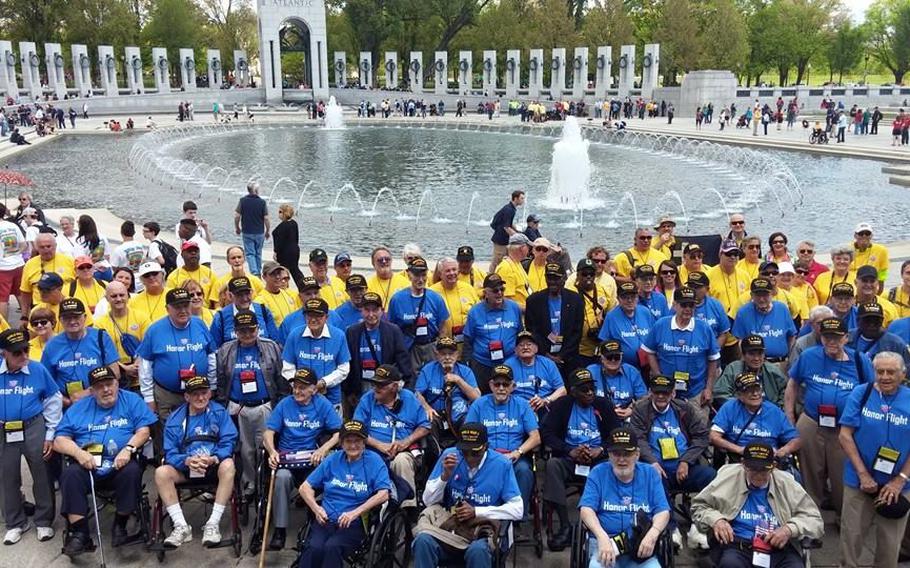 Veterans visit the World War II memorial in Washington during a 2015 Coastal Georgia Honor Flight trip.