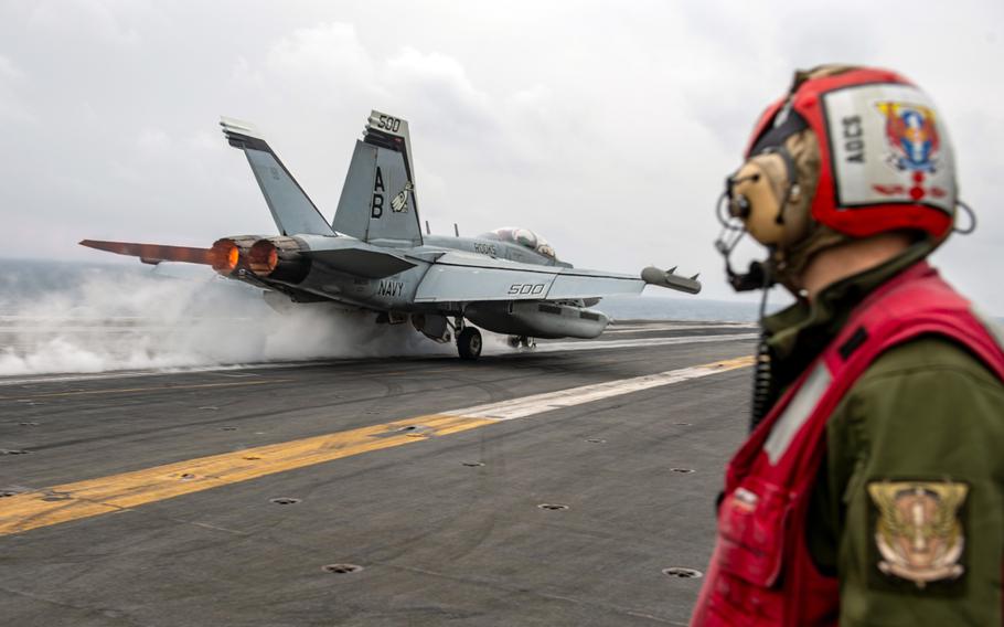 An E/A-18G Growler launches from the flight deck of the  aircraft carrier USS Harry S. Truman, March 30, 2022, in the Adriatic Sea. The Truman carrier strike group's deployment to the 6th Fleet area of operations has been extended.