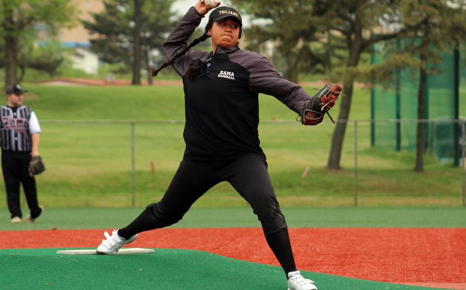 Zama right-hander Kierstyn Aumua delivers during Monday’s Division II baseball tournament. The defending champion Trojans tied E.J. King 0-0 and beat Robert D. Edgren 8-0.