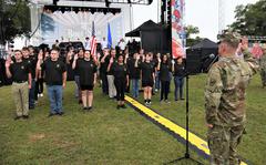 Maj. Gen. David J. Francis, U.S. Army Aviation Center of Excellence and Fort Rucker commander, leads future Soldiers as they recite the Oath of Enlistment at the opening of Fort Rucker's annual Freedom Fest "Rumble Over Rucker" event to kick off the Independence Day weekend June 30, 2022. (U.S. Army photo by Kelly Morris)