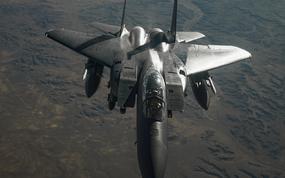 A U.S. Air Force F-15E Strike Eagle prepares to depart after receiving fuel from a KC-135 Stratotanker during a mission supporting Combined Joint Task Force - Operation Inherent Resolve over the U.S. Central Command area of responsibility, Feb. 9, 2021. The KC-135 delivers U.S. Air Forces Central a vital global reach aerial refueling capability to support joint and coalition aircraft throughout the U.S. CENTCOM area of responsibility. In conjunction with partner forces, CJTF-OIR defeats ISIS in designated areas of Iraq and Syria and sets conditions for follow-on operations to increase regional stability. (U.S. Air Force photo by Staff

Sgt. Taylor Harrison)