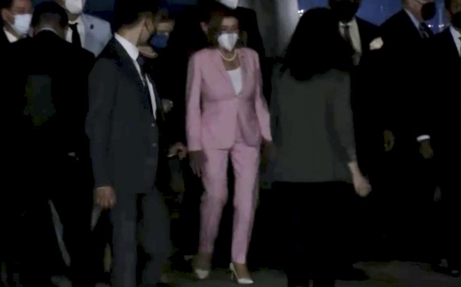 In this image taken from video, U.S. House Speaker Nancy Pelosi arrives in Taipei, Taiwan, Tuesday, Aug. 2, 2022. Pelosi arrived in Taiwan on Tuesday night despite threats from Beijing of serious consequences, becoming the highest-ranking American official to visit the self-ruled island claimed by China in 25 years. 