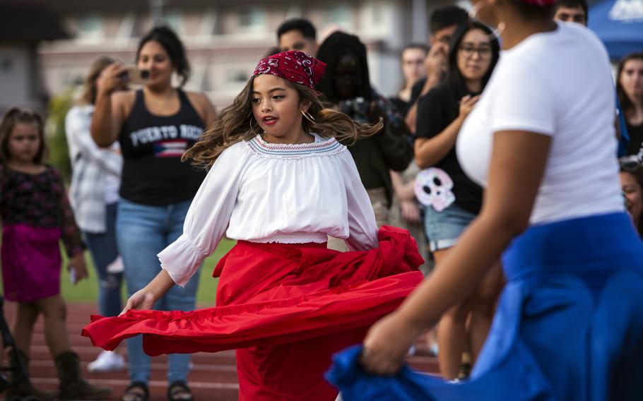 Taylor Saniel dances during a Hispanic Heritage Month celebration at Marine Corps Air Station Iwakuni, Japan, Oct. 13, 2023.