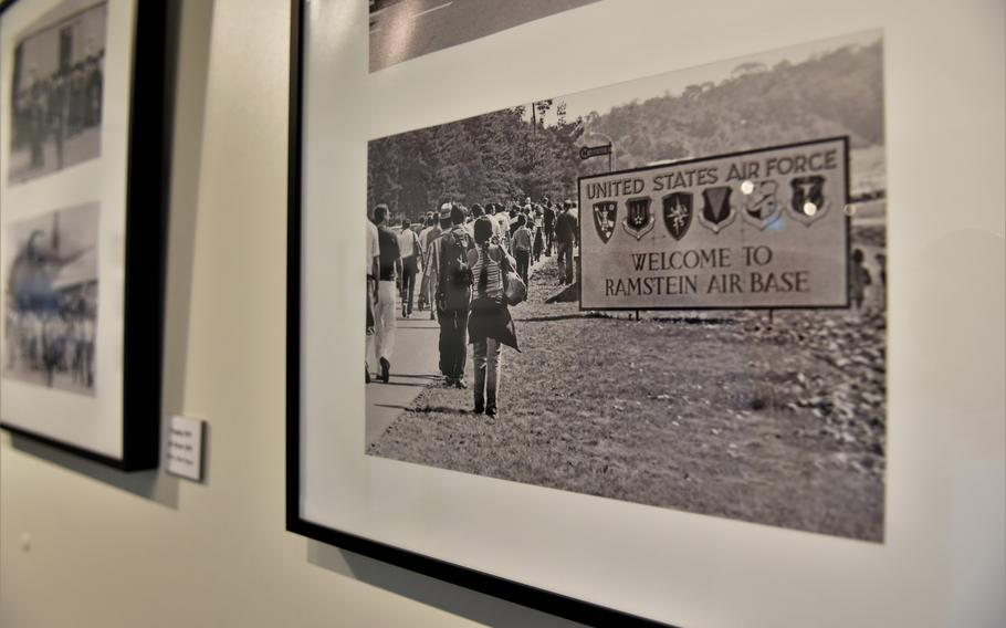 A photograph displayed at the Docu Center Ramstein in Ramstein-Miesenbach, Germany, shows crowds walking to Ramstein Air Base in the late 1970s for the annual air show. U.S. bases in the region used to be open, allowing Germans to come on base for special events.