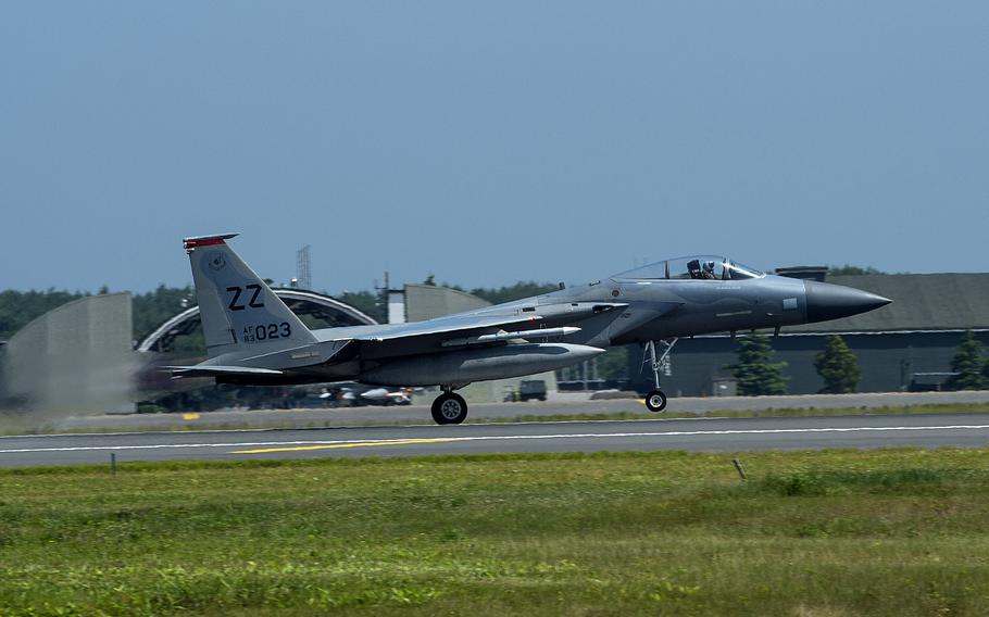 An F-15C Eagle takes off from Misawa Air Base, Japan, in 2017. Nearly half of the respondents in a recent poll think the U.S. needs to scale down its military activities abroad. The survey was conducted by the Eurasia Group Foundation. 