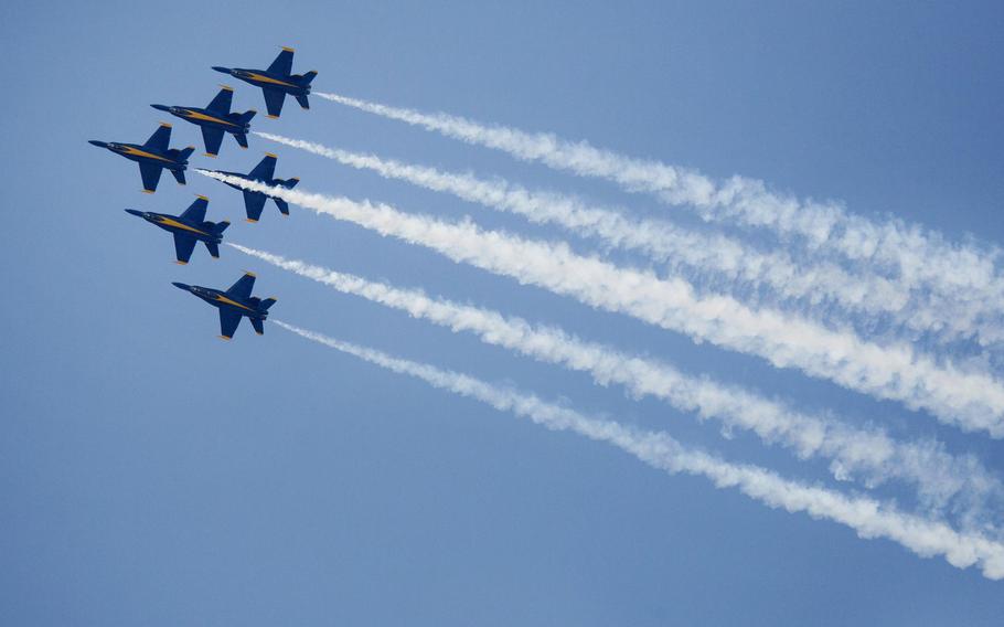 The Blue Angels take to the skies over Oceana Naval Air Station, during a practice run for the 2014 NAS Oceana Air Show.