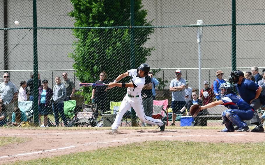 Naples’ Keith Rascoe hits a two-run HR in the first inning during the 2022 DDOEA-Europe  Division II/III championship game against the Aviano Saints.