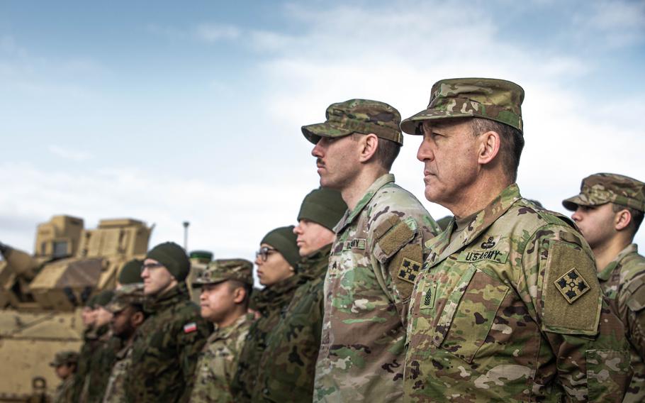 American and Polish soldiers mark the opening of the U.S. Army weapons depot in Powidz, Poland, on April 5, 2023.