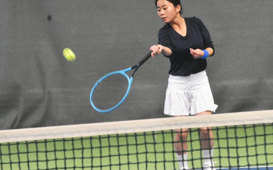 Ansbach’s Meredith Maxwell attempts to lob a shot during a girls singles semifinal Friday, Oct. 22, 2021, at the DODEA-Europe tennis championships.