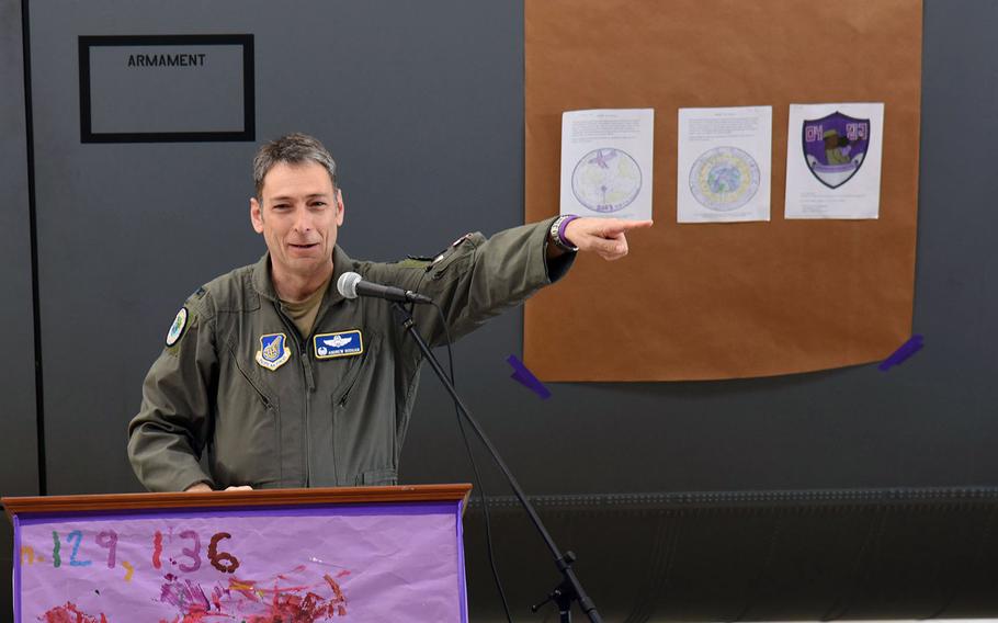 Col. Andrew Roddan, commander of the 374th Airlift Wing, speaks about the student designs that inspired a Month of the Military Child moral patch for airman at Yokota Air Base, Japan, Tuesday, April 11, 2023.