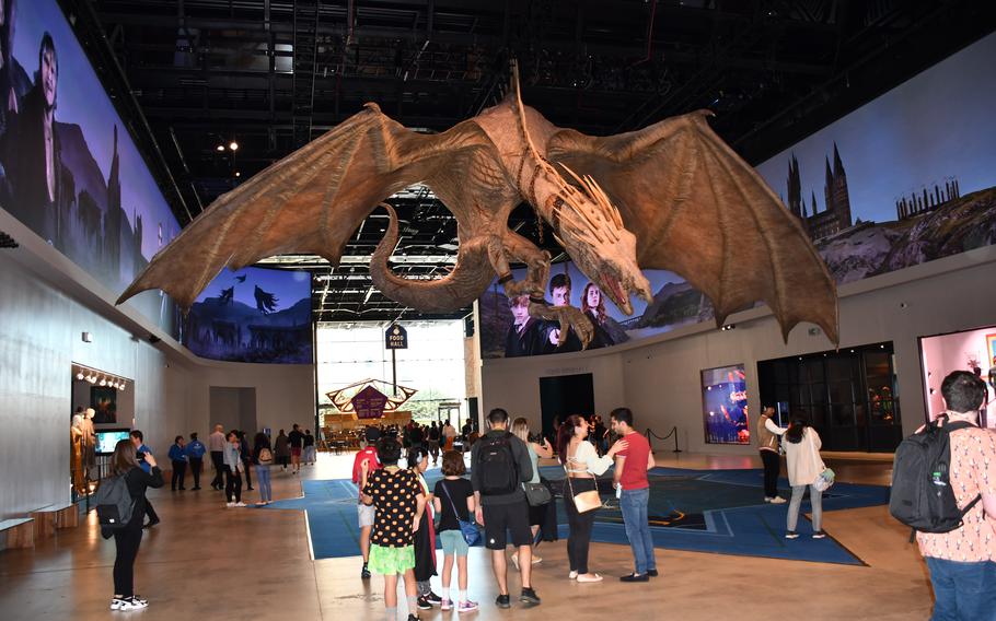 A model prop of the Ukrainian Ironbelly from the movie “Harry Potter and the Deathly Hallows” hangs in the main hallway of the Warner Bros. studio tour The Making of Harry Potter near London.