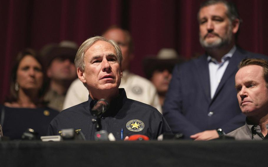 Texas Gov. Greg Abbott, with other officials, holds a news conference to provide updates on the Uvalde Elementary School shooting in Uvalde, Texas, on Wednesday, May 25, 2022. 