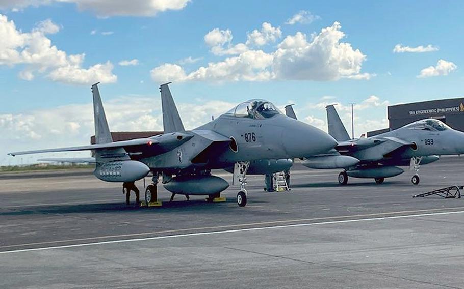 Japanese F-15J Eagle fighters visit what was once Clark Air Base in the Philippines, in this photo tweeted by the Japan Air Self-Defense Force, Wednesday, Dec. 7, 2022.