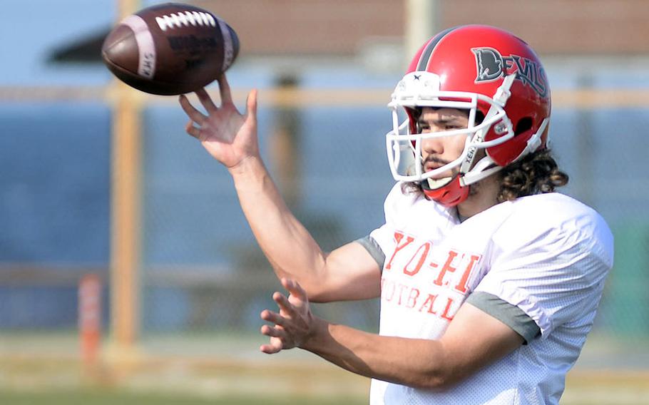 Senior Kaito DeMoss is one of three Nile C. Kinnick quarterback candidates.