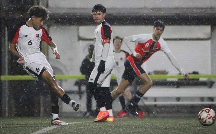Gianni Stevenson boots the ball away.