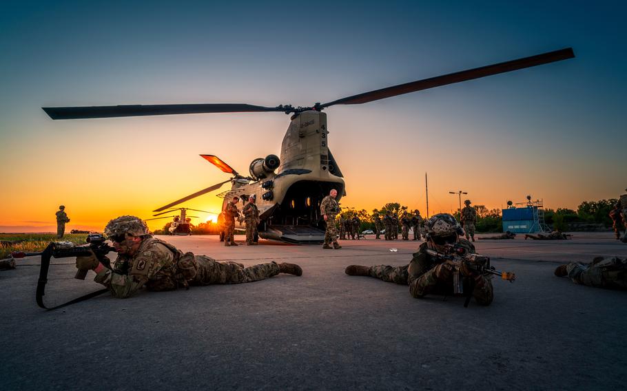 U.S. 173rd Airborne Brigade soldiers rehearse exiting a CH-47 Chinook in preparation for night air assault missions during the Swift Response 21 exercise at Chech Airfield, Bulgaria, on May 11, 2021. 