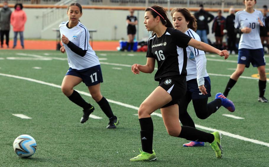 Humphreys’ Hannah Clites chases the ball against the Osan defense during Thursday’s DODEA-Korea soccer match. The teams played to a scoreless draw.