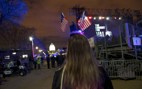 Washington, D.C., Nov. 11, 2014: Thousands of fans, including servicemembers, veterans and loved ones, gathered on the National Mall in Washington, D.C. for the Concert for Valor, a mega-concert in honor of Veterans Day.

META TAGS: Veterans Day; American flag; 