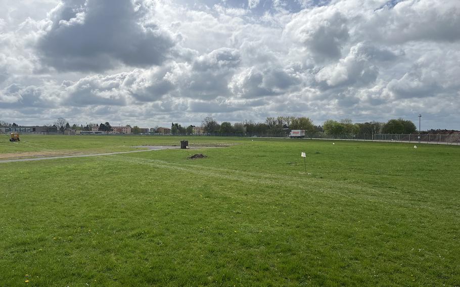 Flags mark planned extraction wells around a concrete pad where firefighter training used to take place at U.S. Army Garrison Ansbach in Germany on April 10, 2024. The area's groundwater is now contaminated with toxic PFAS and must be pumped and purified before it is allowed to flow off base. 