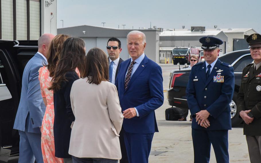 President Joe Biden speaks with Utah leadership Gov. Spencer Cox (left), Mayor Erin Mendenhall (center), and Mayor Jenny Wilson (right), on Aug. 9, 2023 at Roland R. Wright Air National Guard base.