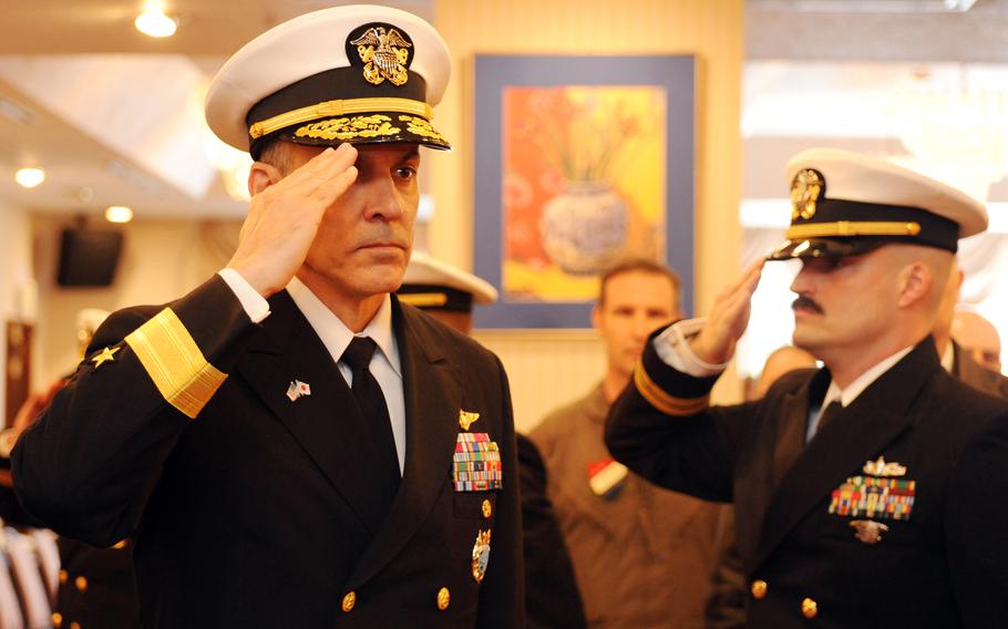 Rear Adm. Greg Newkirk arrives at the Task Force 70 change-of-command ceremony aboard the USS Ronald Reagan at Yokosuka Naval Base, Japan, April 12, 2024.