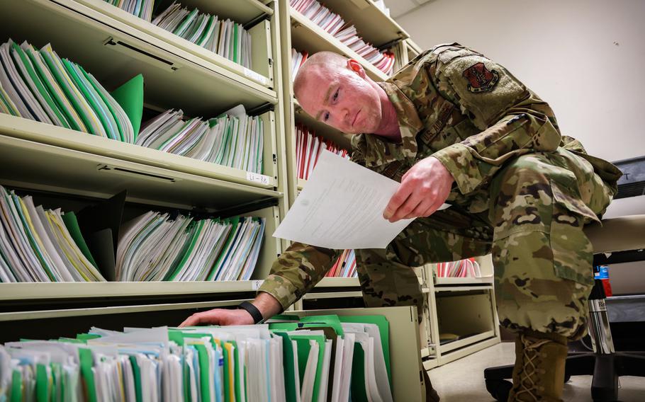 An airman files records in Port Orchard, Wash., March 9, 2022. The Defense Department in a recent court filing agreed to fulfill 15 Freedom of Information Act requests it previously denied to a Stars and Stripes journalist.  