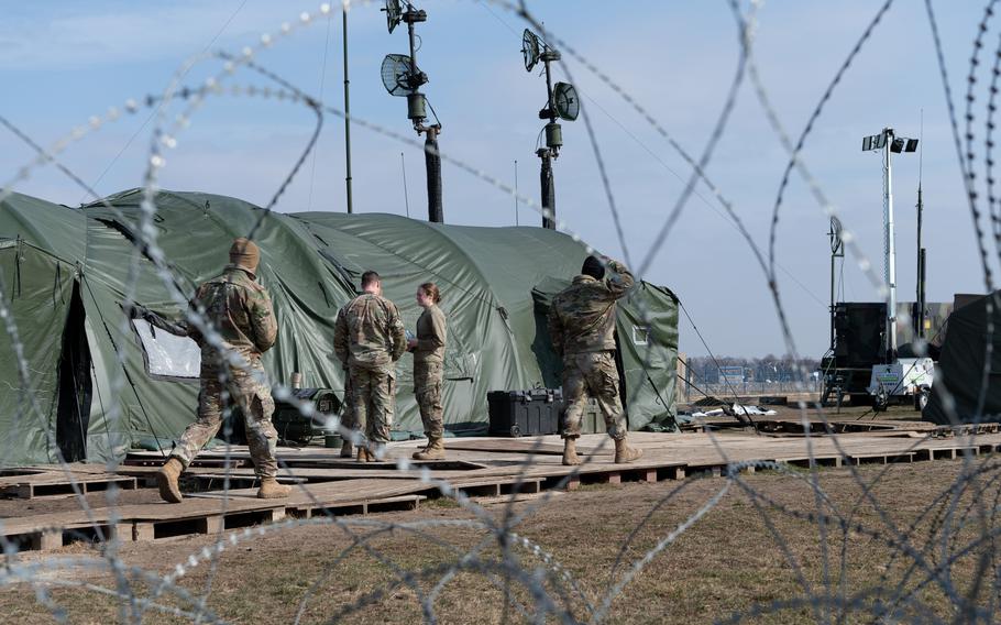 Soldiers go about their duties March 7, 2023, at Delta Battery’s tactical site in southeast Poland, where air defenders have been working for a year to ensure that Western military aid reaches Ukraine.