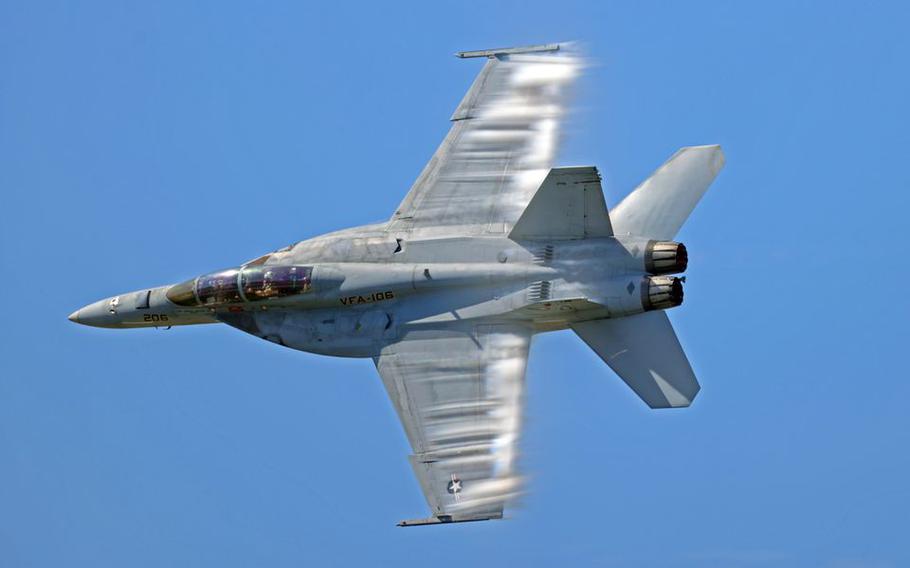 An F/A-18 Super Hornet performs at the  Cleveland National Air Show. The Cleveland National Air Show takes place Labor Day weekend at Burke Lakefront Airport.