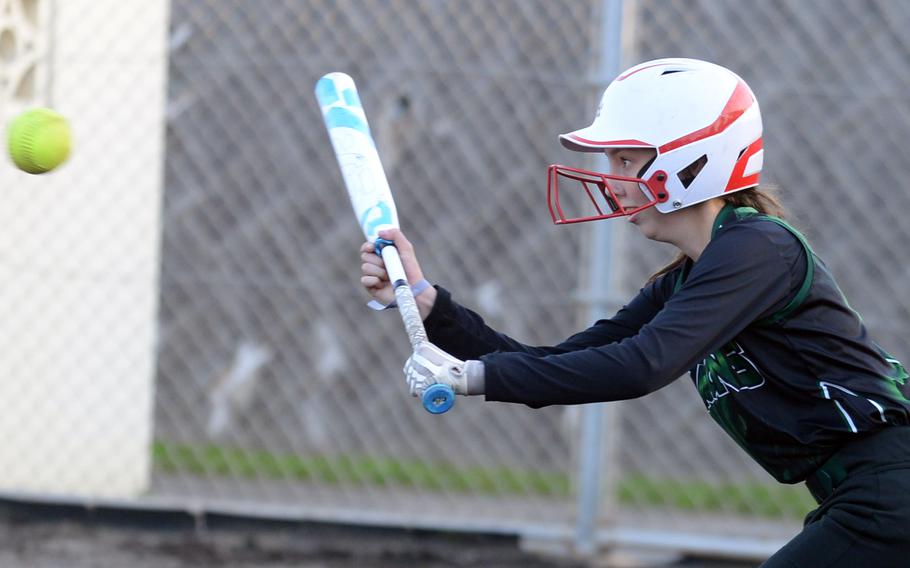 Kubasaki's Selah Allen prepares to drop a bunt against Kadena during Tuesday's DODEA-Okinawa softball game. The Panthers won 8-2 and took a 2-0 season-series lead.