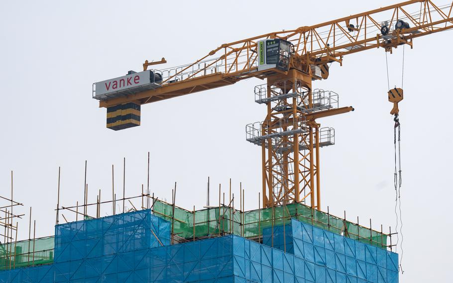 A building under construction at a China Vanke Co. development in Beijing. 