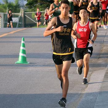 Kadena's Joseph Dluzeski makes his way toward the finish of Friday's Okinawa cross country meet at Camp Foster. Dluzeski won the race and stayed unbeaten on the season.