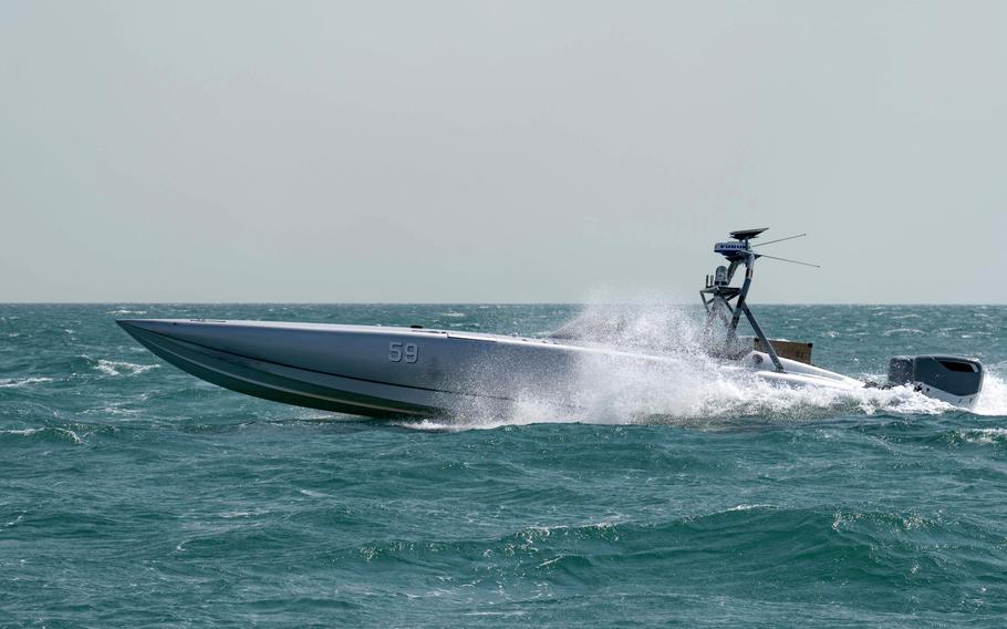 A MARTAC T-38 Devil Ray unmanned boat operates in the Persian Gulf on Oct. 26, 2023. In the recent exercise Digital Talon, missiles were launched from the surface drones. Each one scored a direct hit, a Navy statement said.