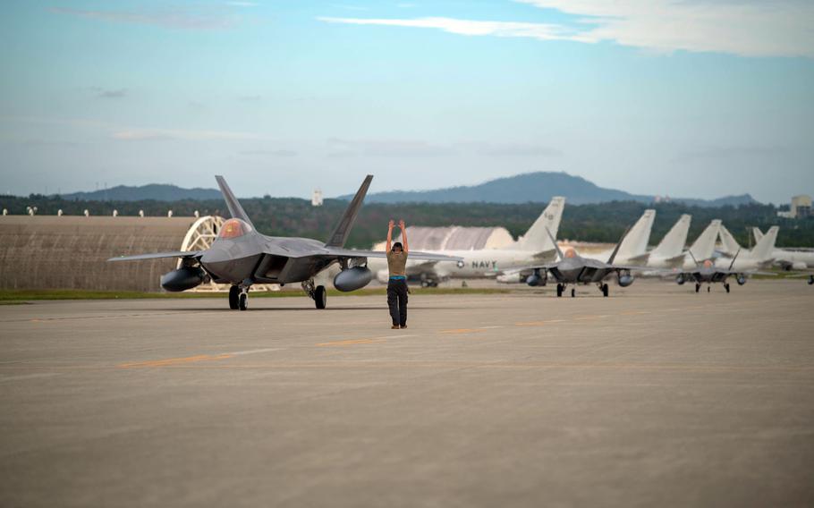 Air Force F-22A Raptors assigned to the 3rd Wing taxi into position at Kadena Air Base, Okinawa, Friday, Nov. 4, 2022. 