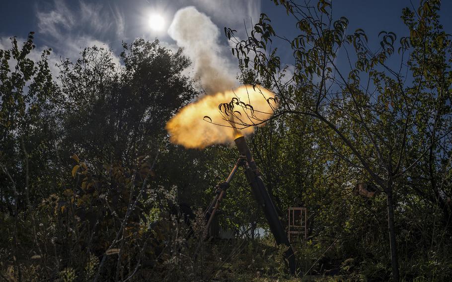 Ukrainian forces fire mortars at a position near Bakhmut, Ukraine, on Oct. 16, 2022.